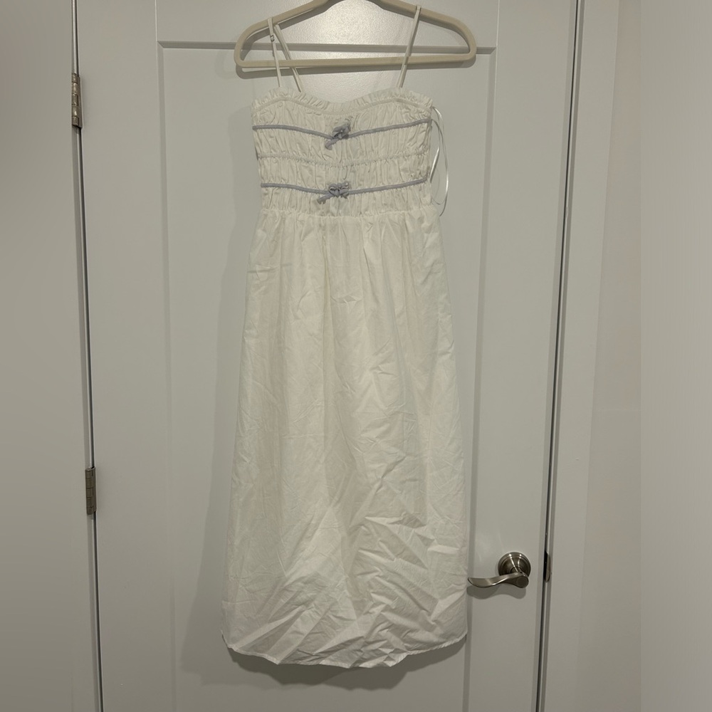 White Maxi Dress with Blue Bow Accents